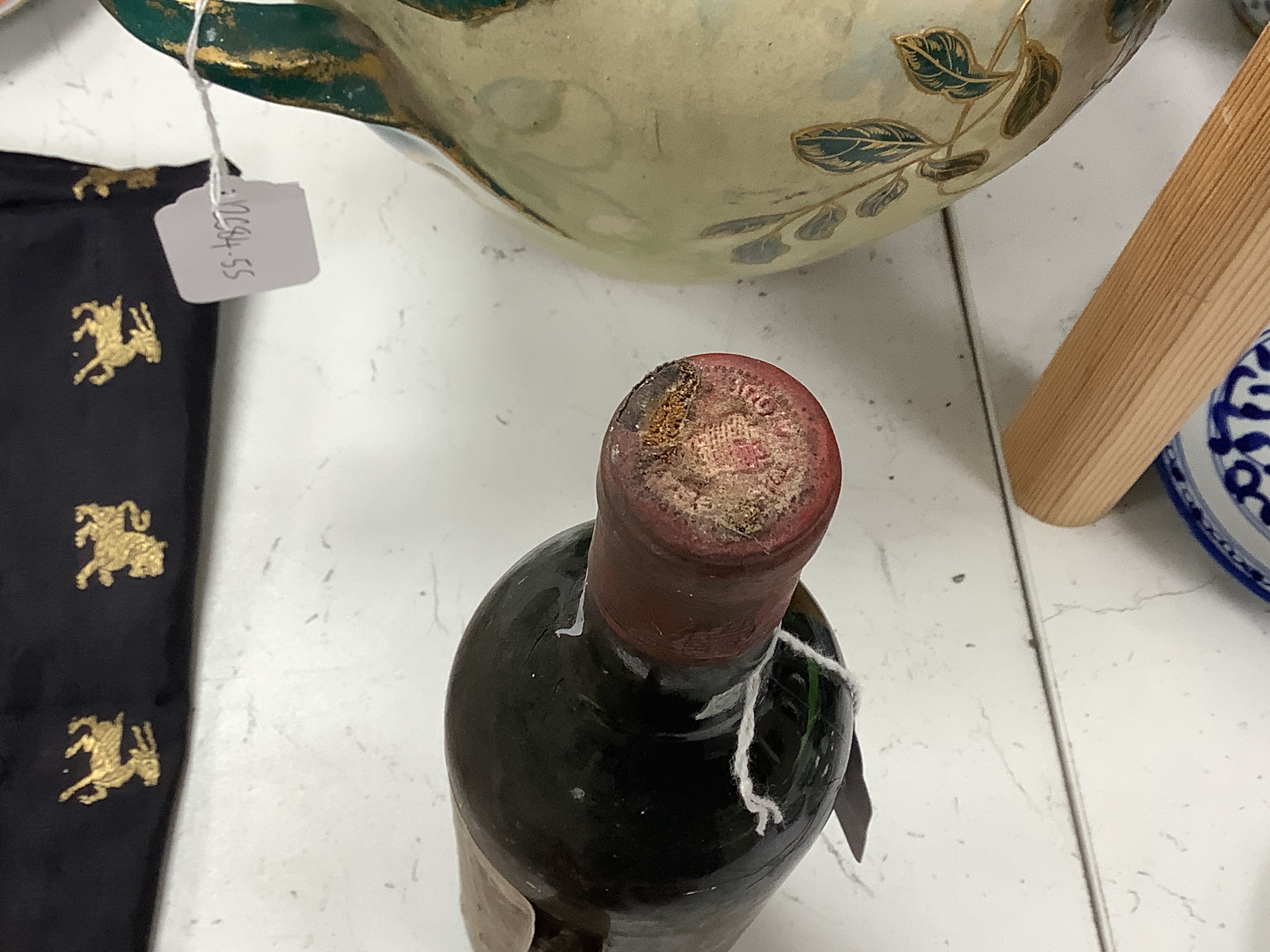 One bottle of 1959 Chateau Latour wine, label damaged